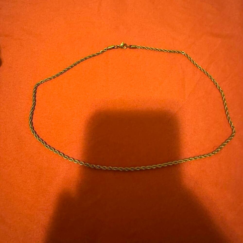 Gold toned rope chain necklace